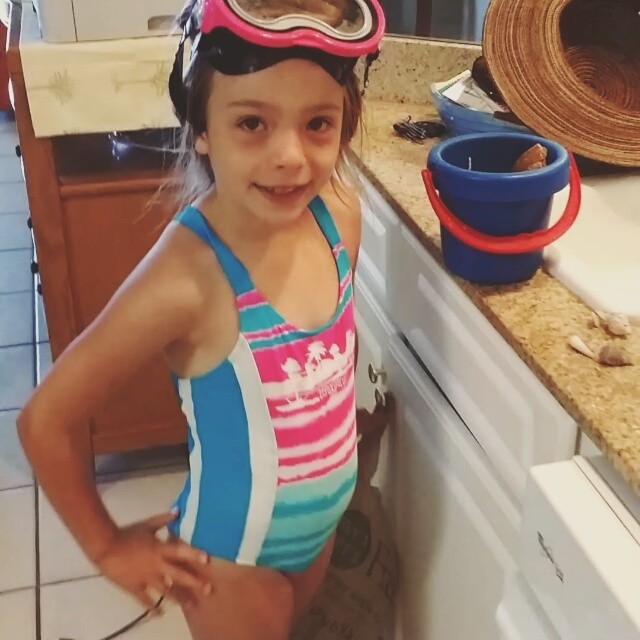 Showing off her seashells she found at the beach. #seashells  #OrangeBeachCondo #OrangeBeach #RegencyIsle